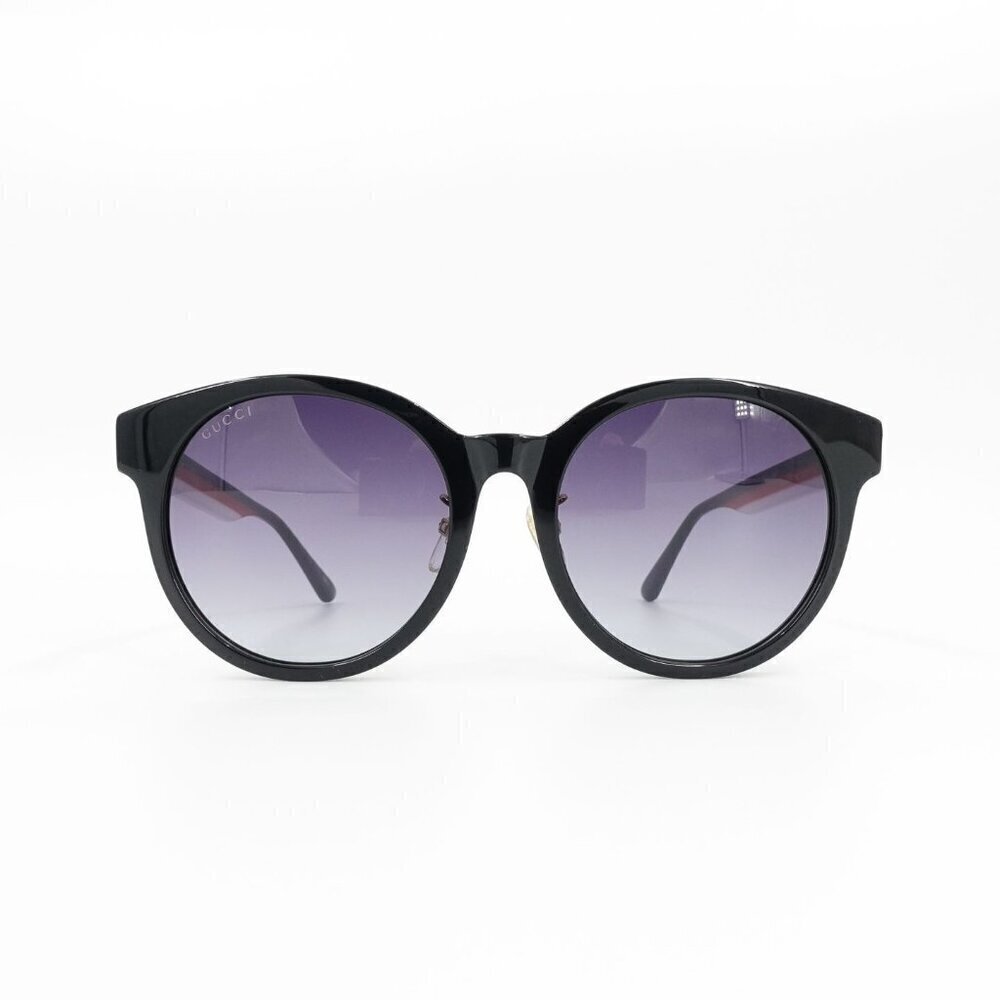 Gucci Women's Sunglasses in Black with Purple Lenses